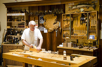 Frank Klausz Using A Hand Plane On His Woodworking Bench Which Is A Traditional European Wooden Workbench 
