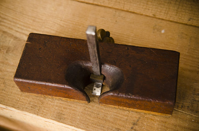 Wood Plane: Top View Of An Antique Wood Router Plane Called An Old Woman'S Tooth Router