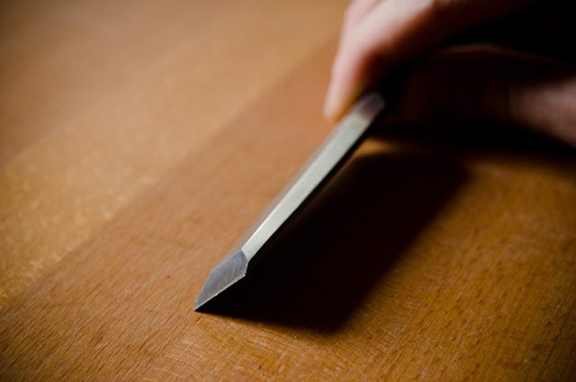 Bevel Edge Bench Chisel On A Woodworking Workbench, Showing The Bevel