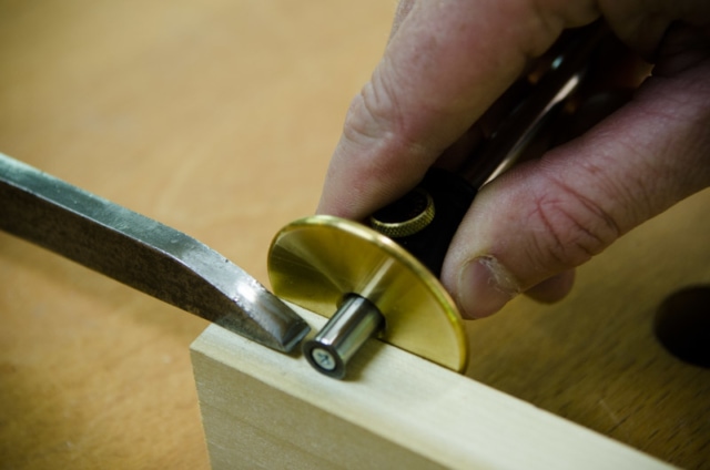 Using A Marking Gauge To Mark A Mortise Next To A Mortise Chisel On A Mortise And Tenon Joint