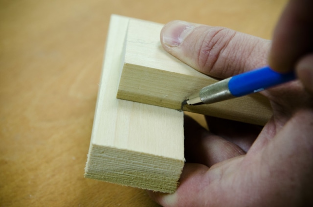 Using A Pencil To Mark The Shoulder Line Of A Mortise And Tenon Joint