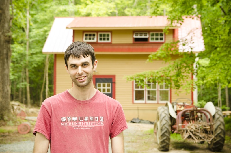 Windsor Chair Maker Elia Bizzarri Standing In Front Of His North Carolina Workshop With A Tractor