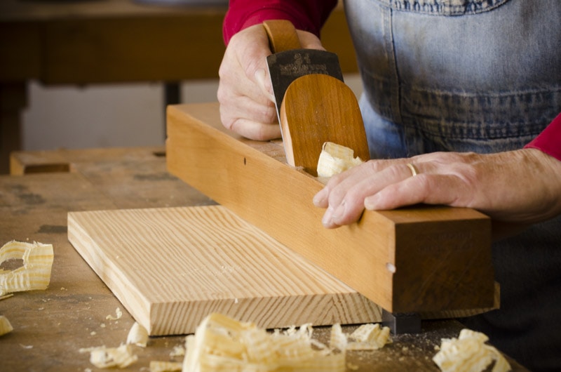 Bill Anderson Using A Wood Plane Or Hand Plane To Flatten The Face Of A Board