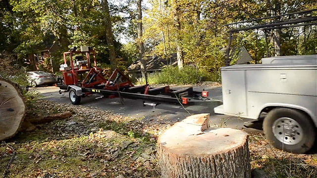 Truck Pulling A Portable Bandsaw Mill