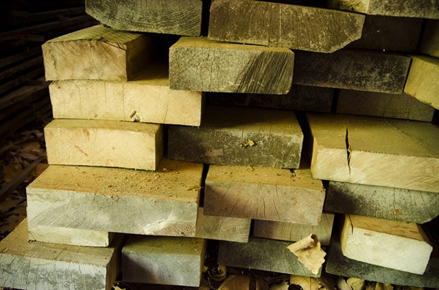 Lumber Yard Boards Stacked In A Wood Pile