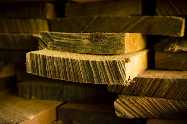 Kiln Dried Wood Lumber Stacked In A Pile At A Lumber Yard Saw Mill For Woodworking