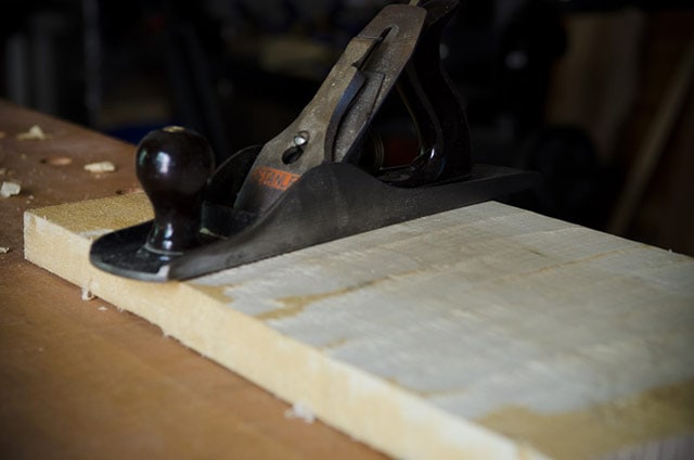 Flatten Board By Hand Planing With Stanley Hand Plane On A Wood Work Bench