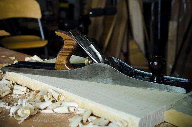 Flatten Board By Hand Planing With No. 7 Jointer Stanley Plane On A Wood Work Bench