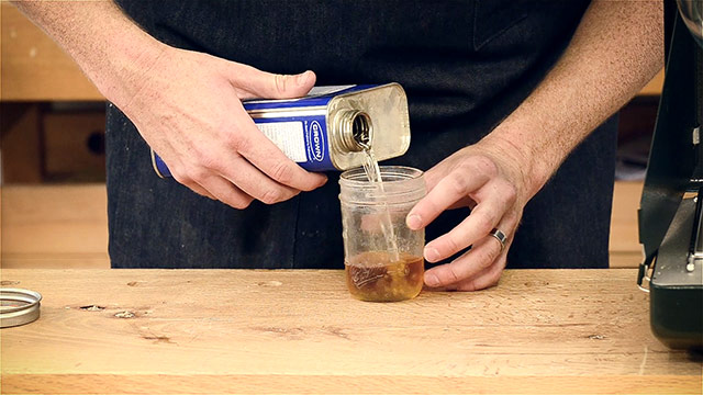 Pouring Turpentine For A Beeswax Furniture Polish