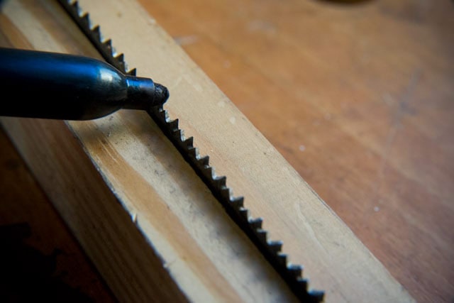 Using A Sharpie Marker To Mark Hand Saw Teeth While Sharpening A Hand Saw
