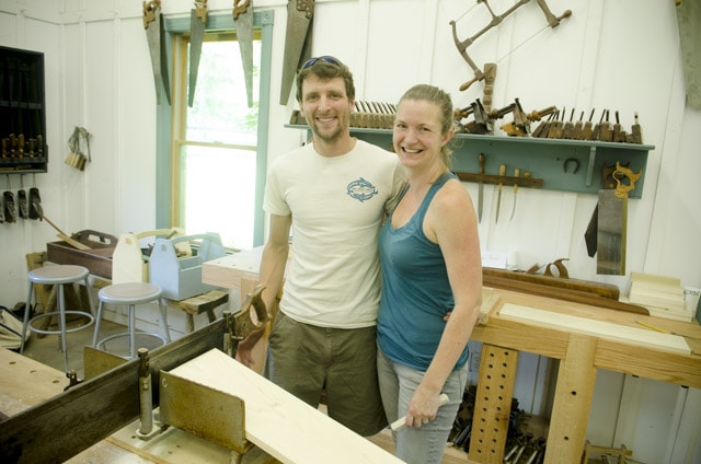 A Young Couple Taking A Woodworking Class At The Wood And Shop Traditional Woodworking School Surrounded By Woodworking Workbenches