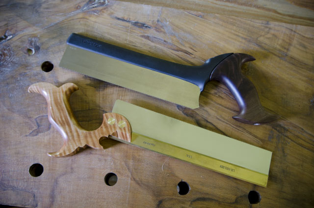 Lie-Nielsen Dovetail Saw And Veritas Dovetail Saw Laying Side By Side On A Ambrosia Maple Woodworking Workbench 