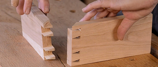 Dave Heller Holding Two Boards With A London Style Dovetail Joint