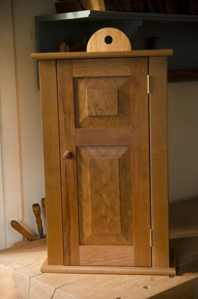 Cherry Hanging Shaker Wall Cupboard With Door Closed Built By Joshua Farnsworth