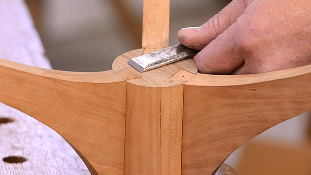 Hand Using A Chisel To Cut A Sliding Dovetail Joint On A Candle Stand Spindle By Will Myers