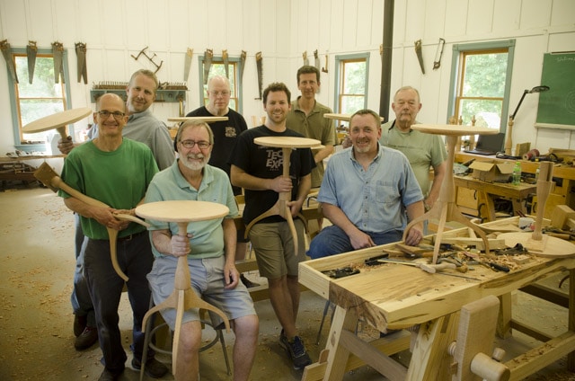 Woodworking Students In A Woodworking Class Holding Shaker Candle Stand Tables With Moravian Workbenches