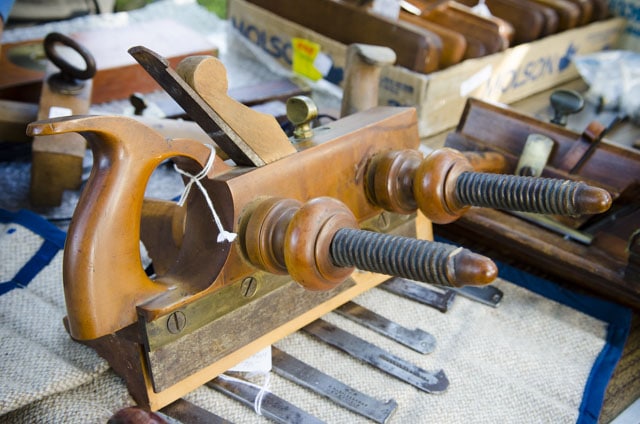 Wooden Plow Plane With Array Of Irons At A Tool Sale