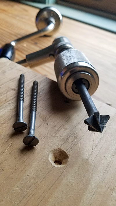 Vintage Countersink Auger Bit In A Stanley Yankee 2101 Brace And Bit Manual Hand Drill With Slotted Screws Nearby