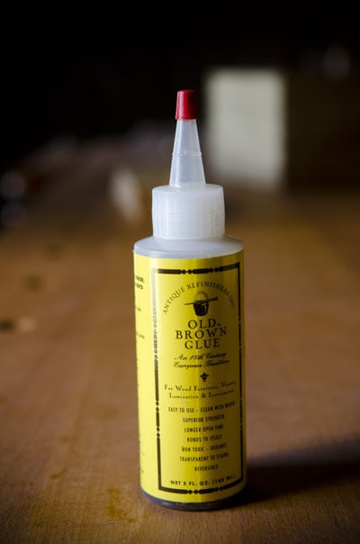 A Bottle Of Old Brown Glue Hide Glue On A Woodworking Workbench