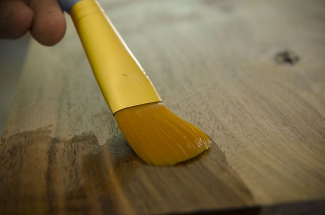 Taklon Brush Applying Shellac Finish To A Walnut Board
