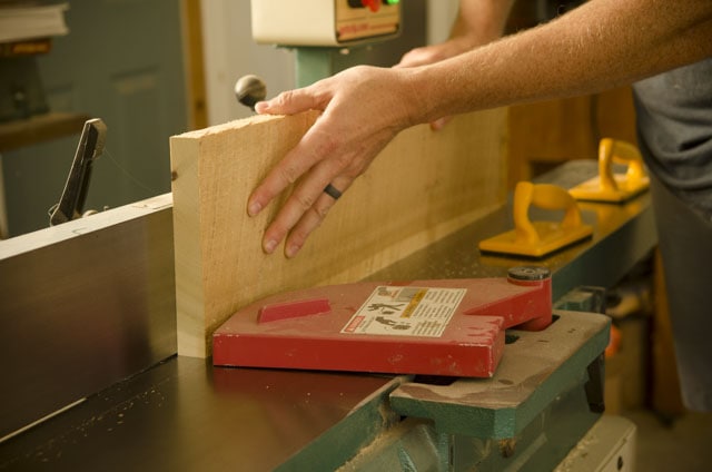 Joshua Farnsworth Jointing The Edge Of A Board On A Grizzly Power Jointer
