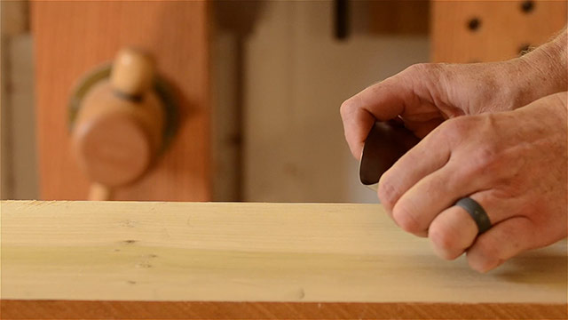 Using A Woodworking Card Scraper On A Board