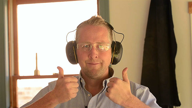 Joshua Farnsworth Wearing Safety Glasses And Hearing Protection Giving A Thumbs Up