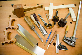 Woodworking Hand Tools Spread Out On A Woodworking Workbench