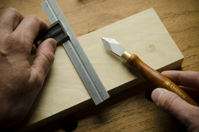 Narex Marking Knife After Cutting A Knife Line On A Board With A Double Square For Woodworking