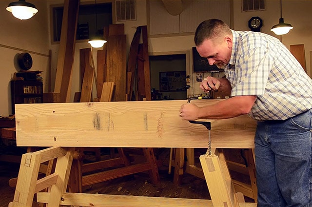 Will Myers Using A Brace And Bit To Bore A Hole In A Moravian Workbench For Blind Pegging The Top To The Undercarriage