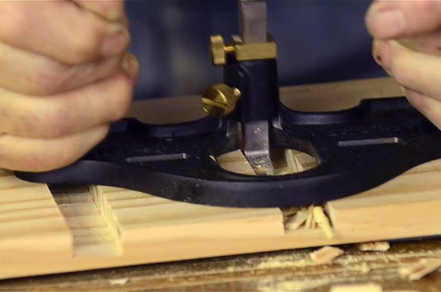 Woodworker Using A Lie-Nielsen Large Router Plane To Make A Dado Joint