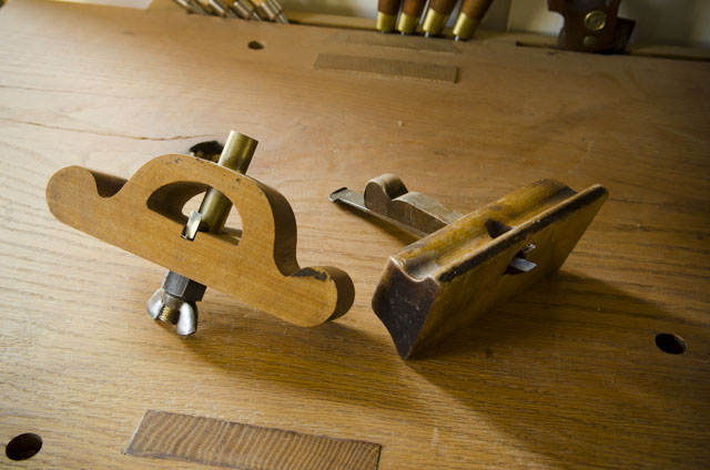A Wooden Router Plane With A Thumb Screw And Another With A Wedge