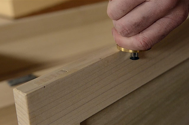 Using a marking gauge while Installing butt hinges on a dovetail chest