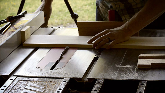Joshua Farnsworth Cross Cutting Lumber Boards With A Miter Gauge On A Saw Stop Cabinet Table Saw For A Dovetail Box