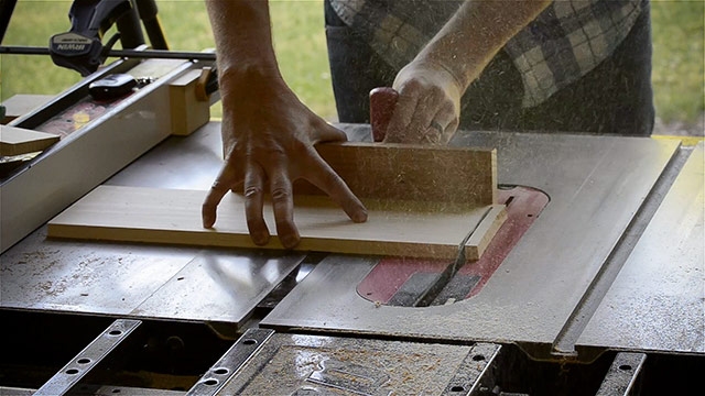 Joshua Farnsworth Cross Cutting Lumber Boards With A Miter Gauge On A Saw Stop Cabinet Table Saw For A Dovetail Box