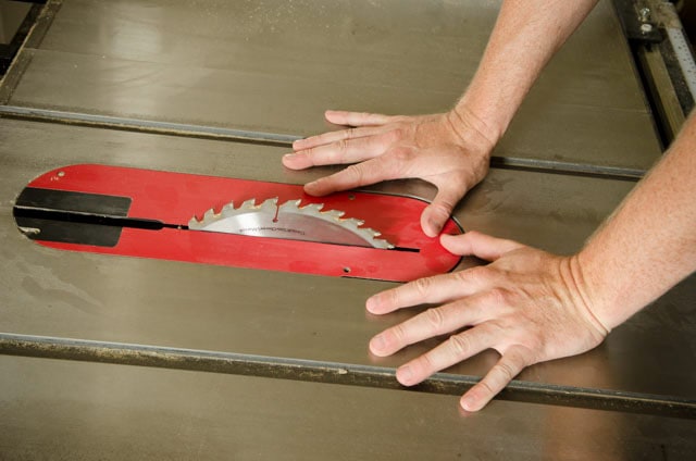 Hands Next To A Table Saw Blade Best Table Saw Guide