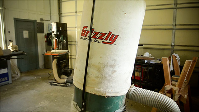 Grizzly Dust Collector Filter Explanded In A Woodworking Workshop