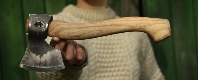 Girl With Spoon Carving Axe