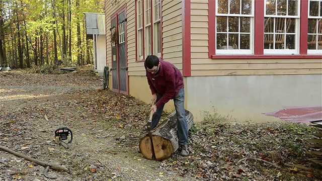 Elia Bizzarri Split A Log With A Wood Splitting Wedge And Sledge Hammer 
