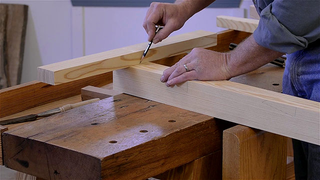 Using A Pencil To Mark A Tenon Location On A Mortise And Tenon Joint