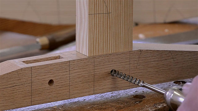 Using An Auger Bit To Mark A Drawbore Hole On A Mortise And Tenon Joint