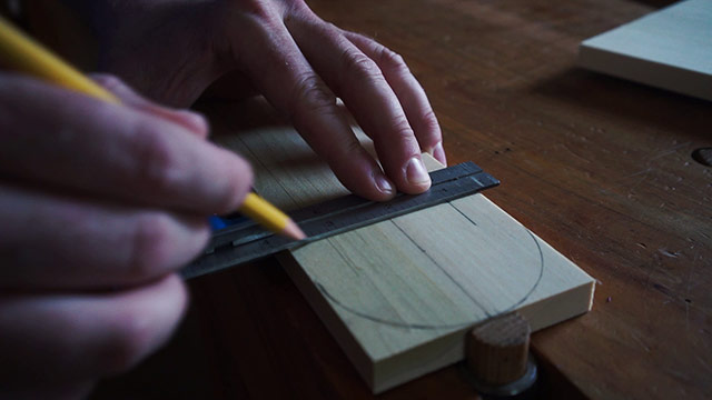 Using A Combination Square And Pencil To Layout A Wooden Pizza Peel