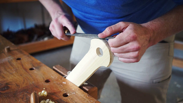 Using A Rasp To Refine A Wooden Pizza Peel Handle