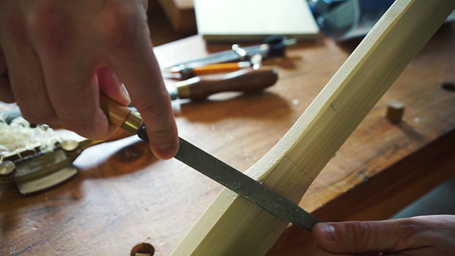 Using A Rasp To Refine A Wooden Pizza Peel Handle