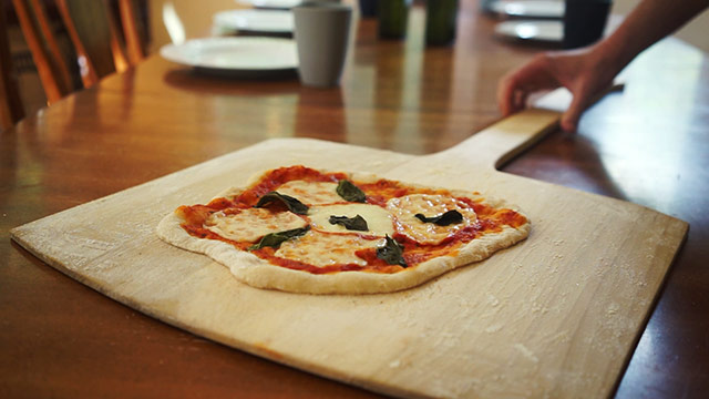 Margherita Pizza On A Wooden Pizza Peel 